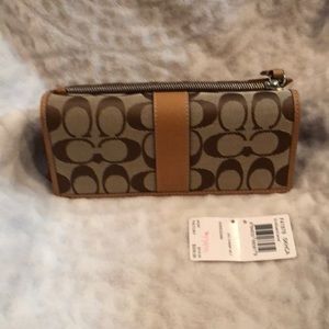 Beautiful new Coach wallet with check book holder